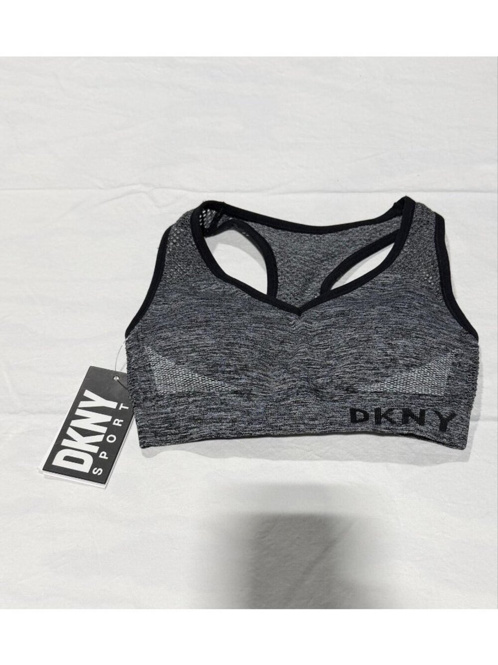 DKNY Sport Medium Impact Seamless Mesh-Back Sports Bra in a heathered grey and b